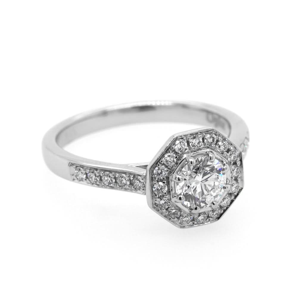 A Platinum Brilliant-Cut Octagonal Diamond Cluster Ring with Diamond-Set Shoulders - Image 2
